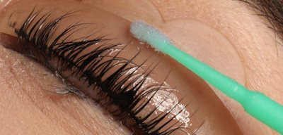 Young,Woman,Undergoing,Eyelash,Lamination,,Closeup.,Professional,Service
